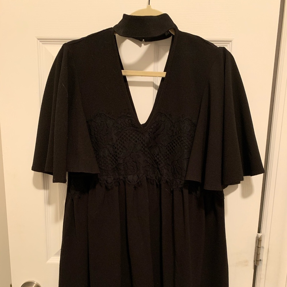 Black, collared dress with embroidered bodice